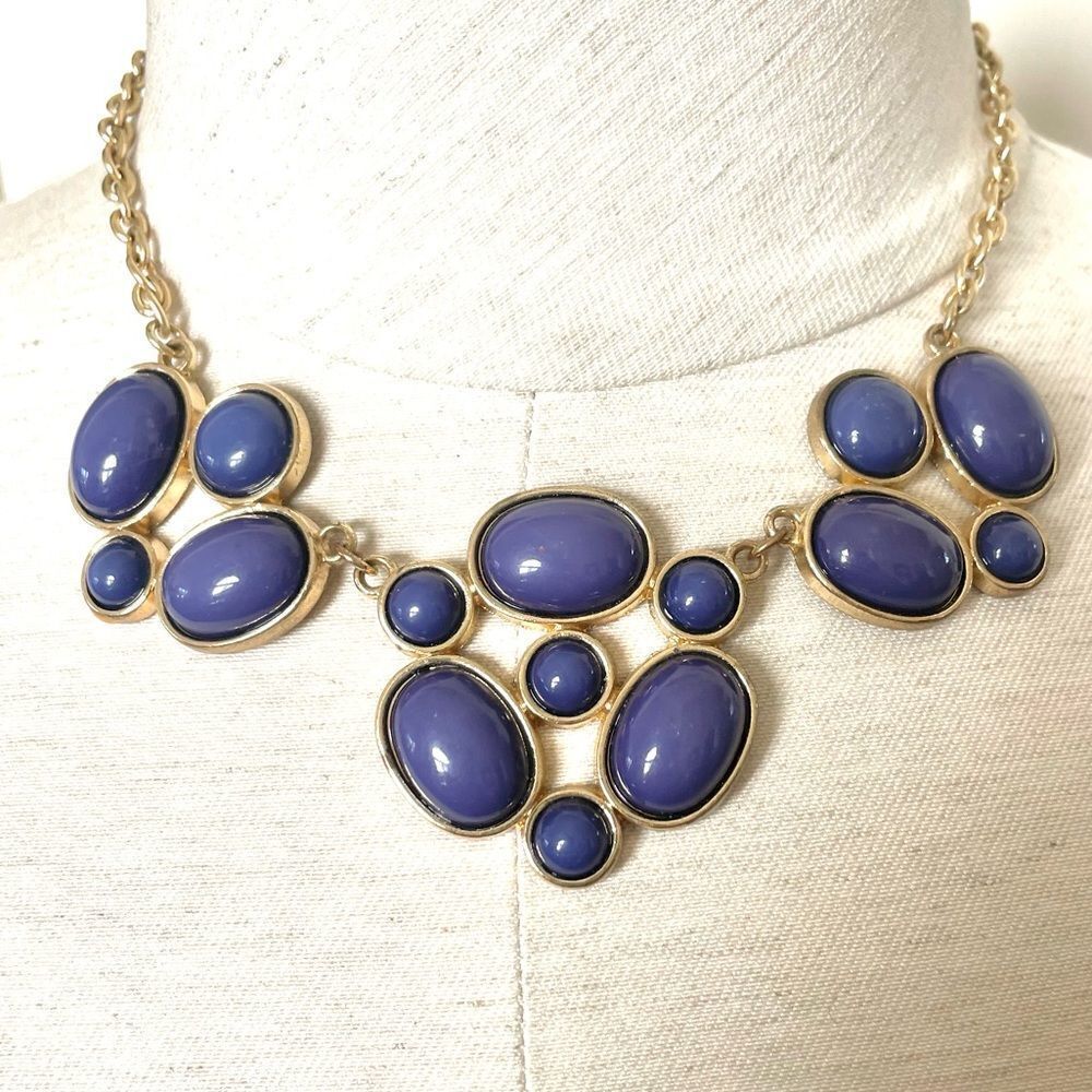 Gold tone blue statement necklace